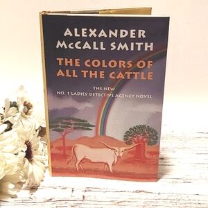 The Colors of all the Cattle by Alexander McCall Smith adult novel…